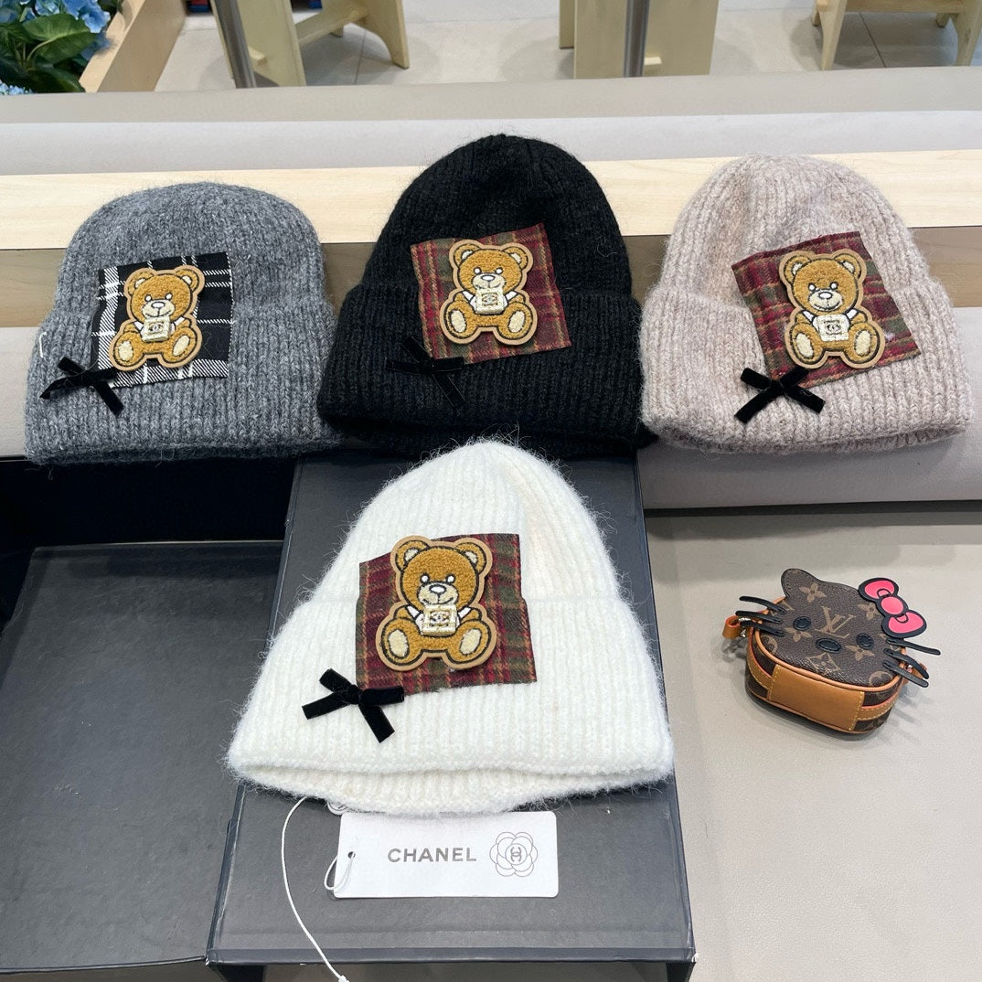 BEANIE HAT IN BLACK WOOL WITH BOW 421254