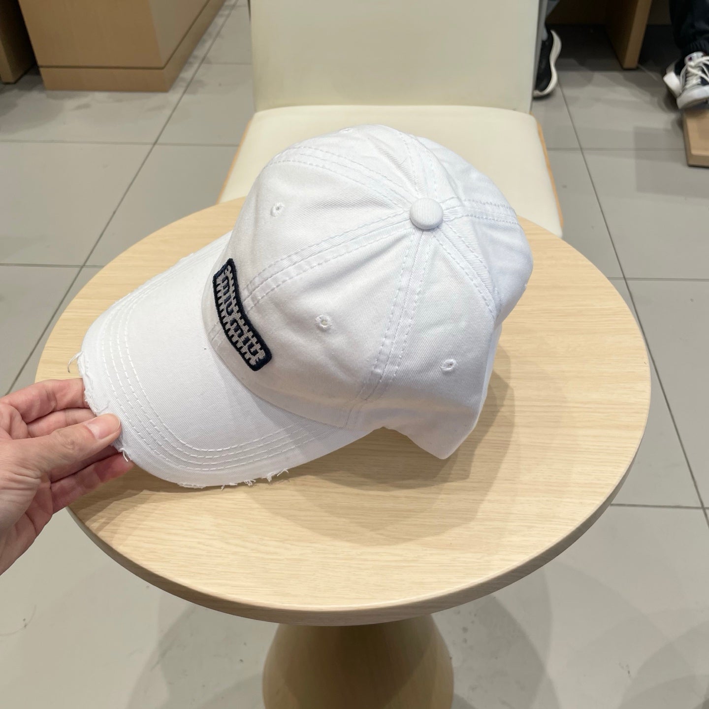 MM DISTRESSED FABRIC BASEBALL CAP IN WHITE WITH EMBROIDERED LOGO