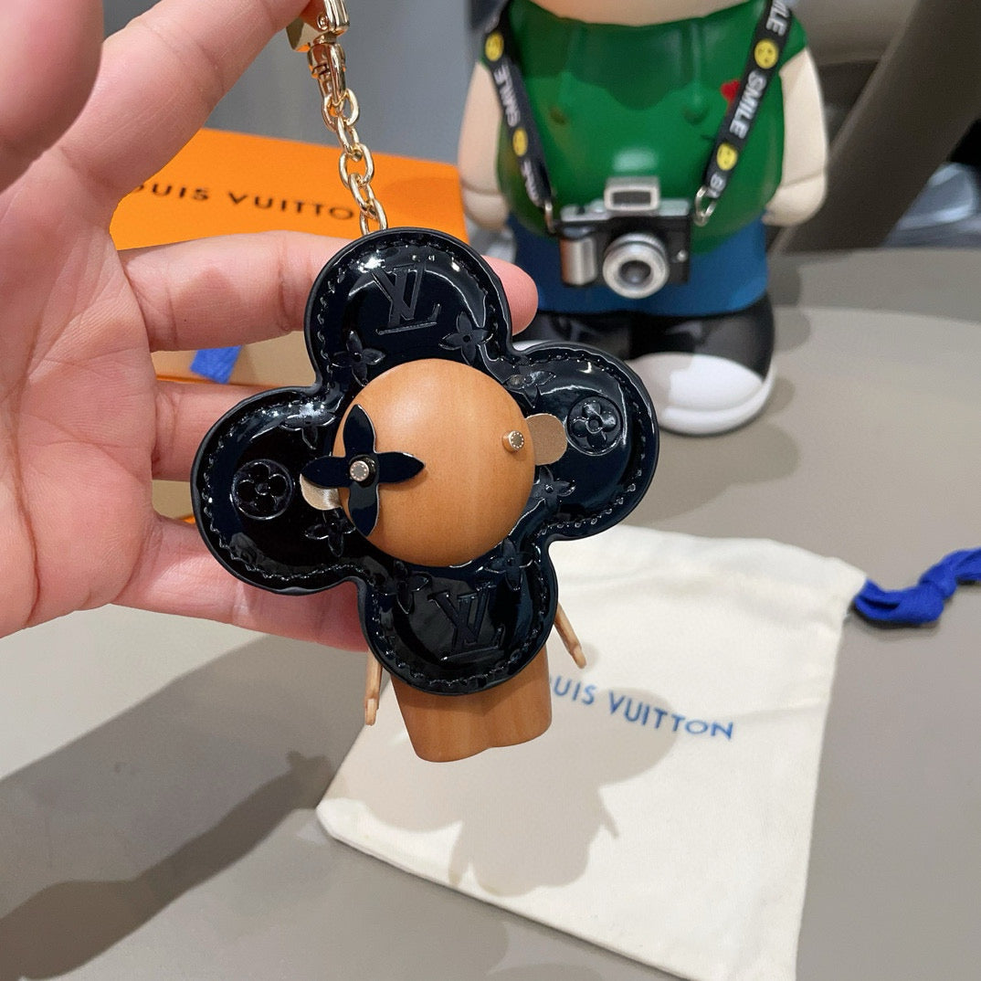LV KEYCHAIN IN BLACK CALFSKIN AND WOOD