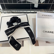 CHANEL 26S BOW SCRUNCHIE IN BLACK AND WHITE SILK 512104