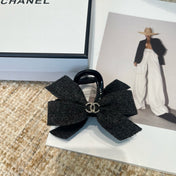 CHANEL 26S BOW HAIR CLIP IN BLACK RIBBON 505311