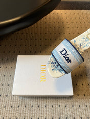 DIOR 26S SLIDES DWAY IN WHITE BLUE EMBROIDERED CANVAS WITH LOGO & FLORAL PRINT FOOTBED