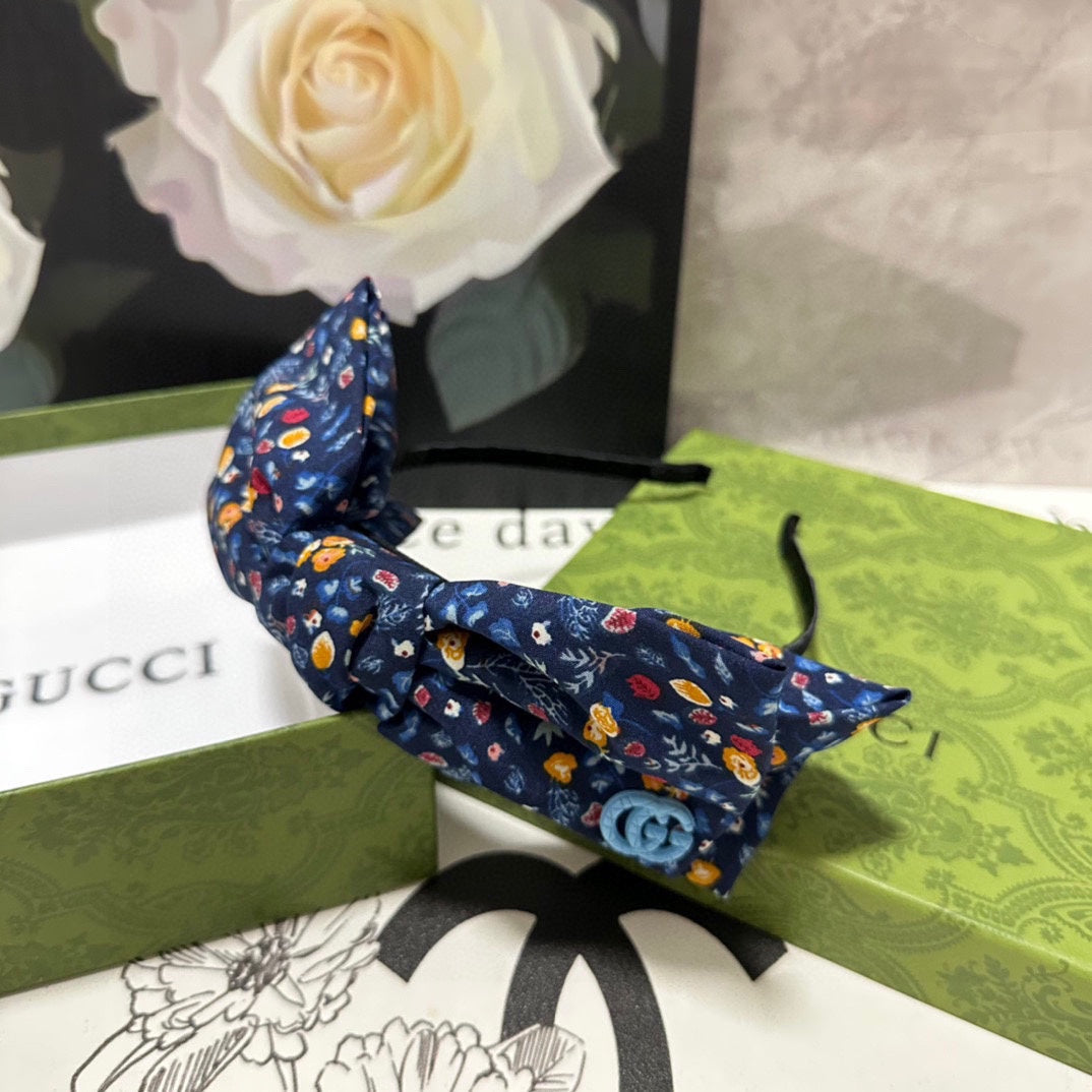 HAIRBAND IN NAVY BLUE FLORAL FABRIC 385854