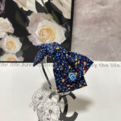 HAIRBAND IN NAVY BLUE FLORAL FABRIC 385854