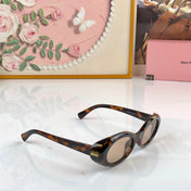 MIUMIU 26S OVAL FRAME IN ACETATE 426527