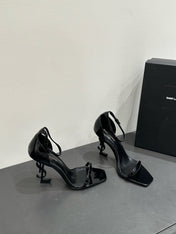 YSL HEELED SANDALS 25S 105 MM IN BLACK GLOSSY LAMBSKIN