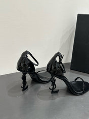 YSL HEELED SANDALS 25S 105 MM IN BLACK GLOSSY LAMBSKIN