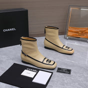 CHANEL 26S ANKLE BOOTS IN BEIGE CALFSKIN WITH BLACK PATENT LEATHER TRIM AND CC LOGO ON TOE CAP