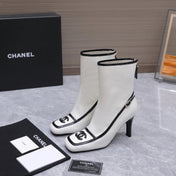CHANEL 26S ANKLE BOOTS 80 MM IN WHITE CALFSKIN WITH BLACK PATENT LEATHER TRIM AND CC LOGO ON TOE CAP