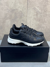 CHANEL 26S RUNNER CC LOGO SNEAKERS IN BLACK CALFSKIN