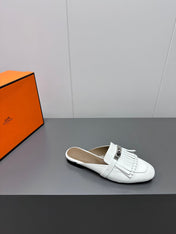 0Z MULE IN WHITE LAMBSKIN WITH FRINGE DETAIL