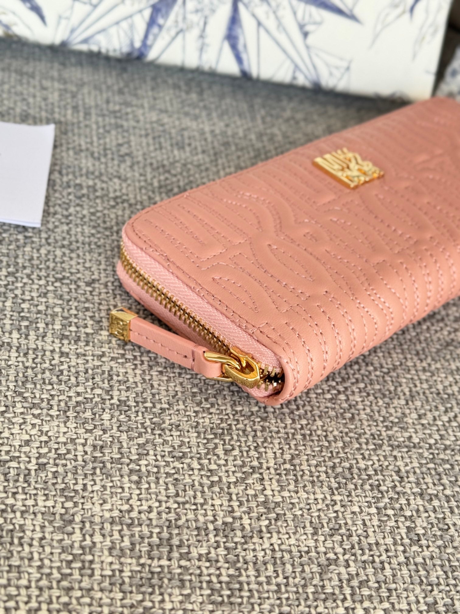 VERTICAL LONG ZIP WALLET 20 IN BABY PINK QUILTED ALLOVER CALFSKIN