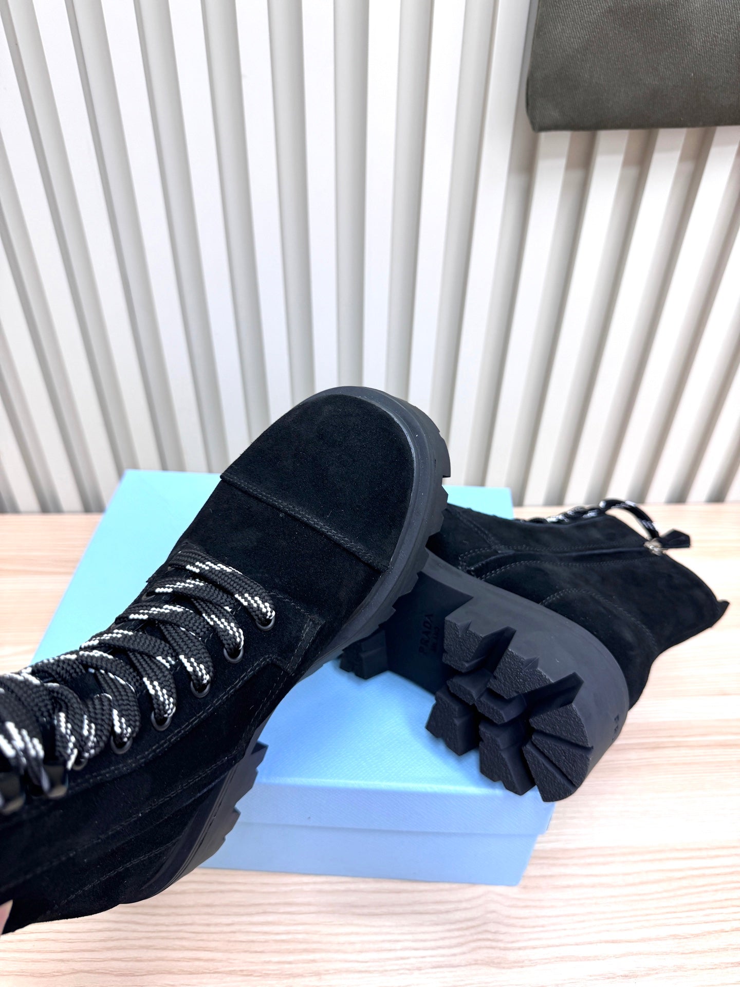 PRADA 25S MONOLITH BOOTS IN BLACK SUEDE