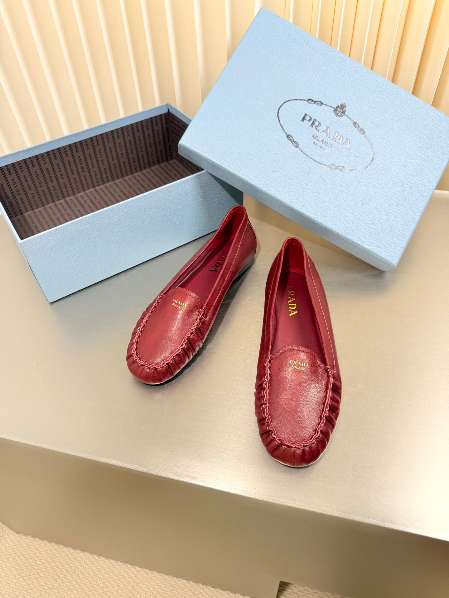 PRADA 26S CLASSIC LOAFERS IN DARK RED LAMBSKIN