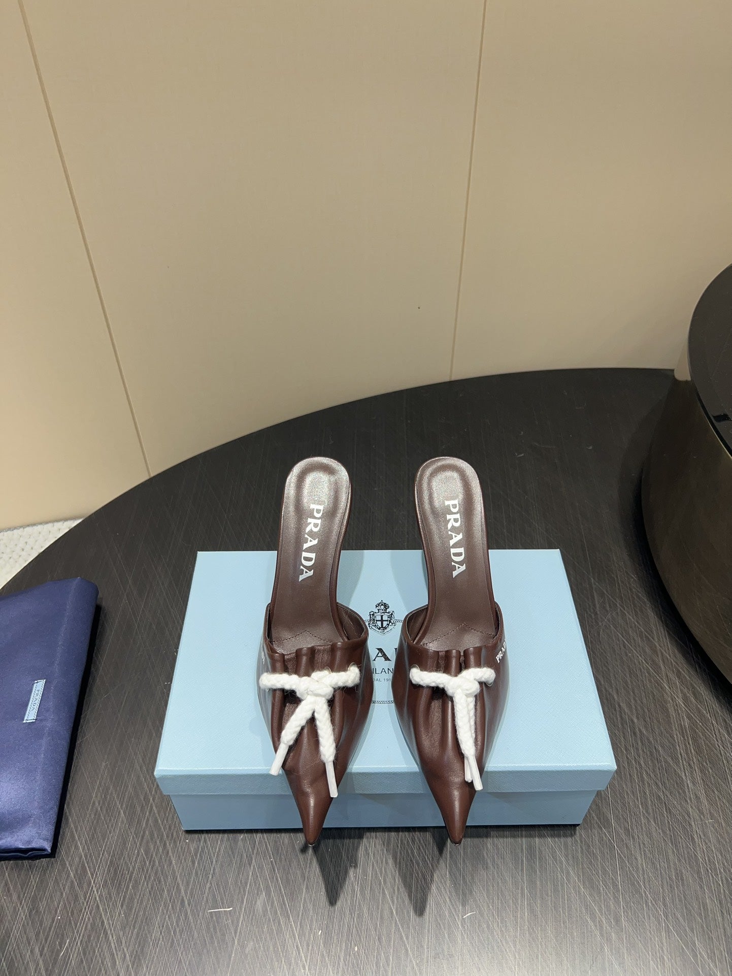 PRADA 25S BRAIDED DETAIL MULES 85MM IN DARK BROWN CALFSKIN