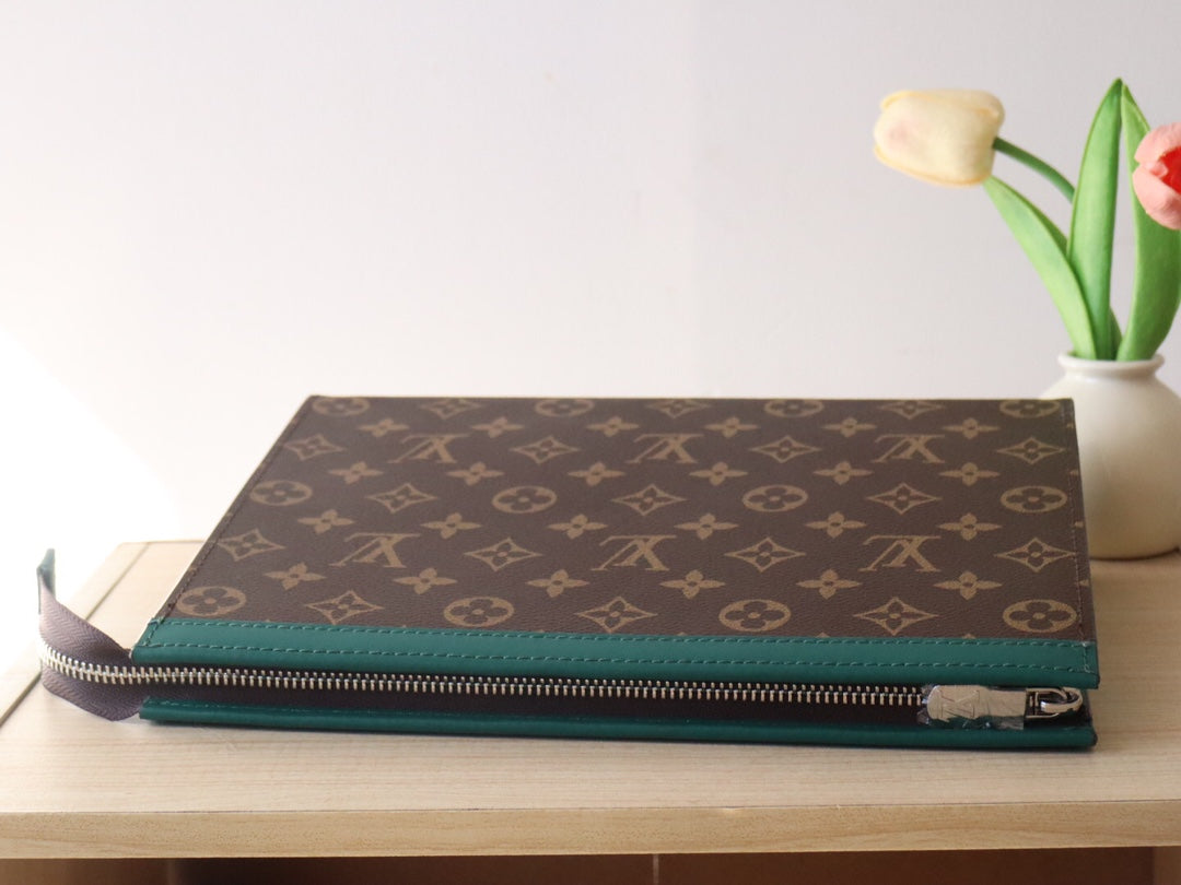 LV 25S POCHETTE VOYAGE 26 IN BORNEO GREEN MONOGRAM MACASSAR COATED CANVAS