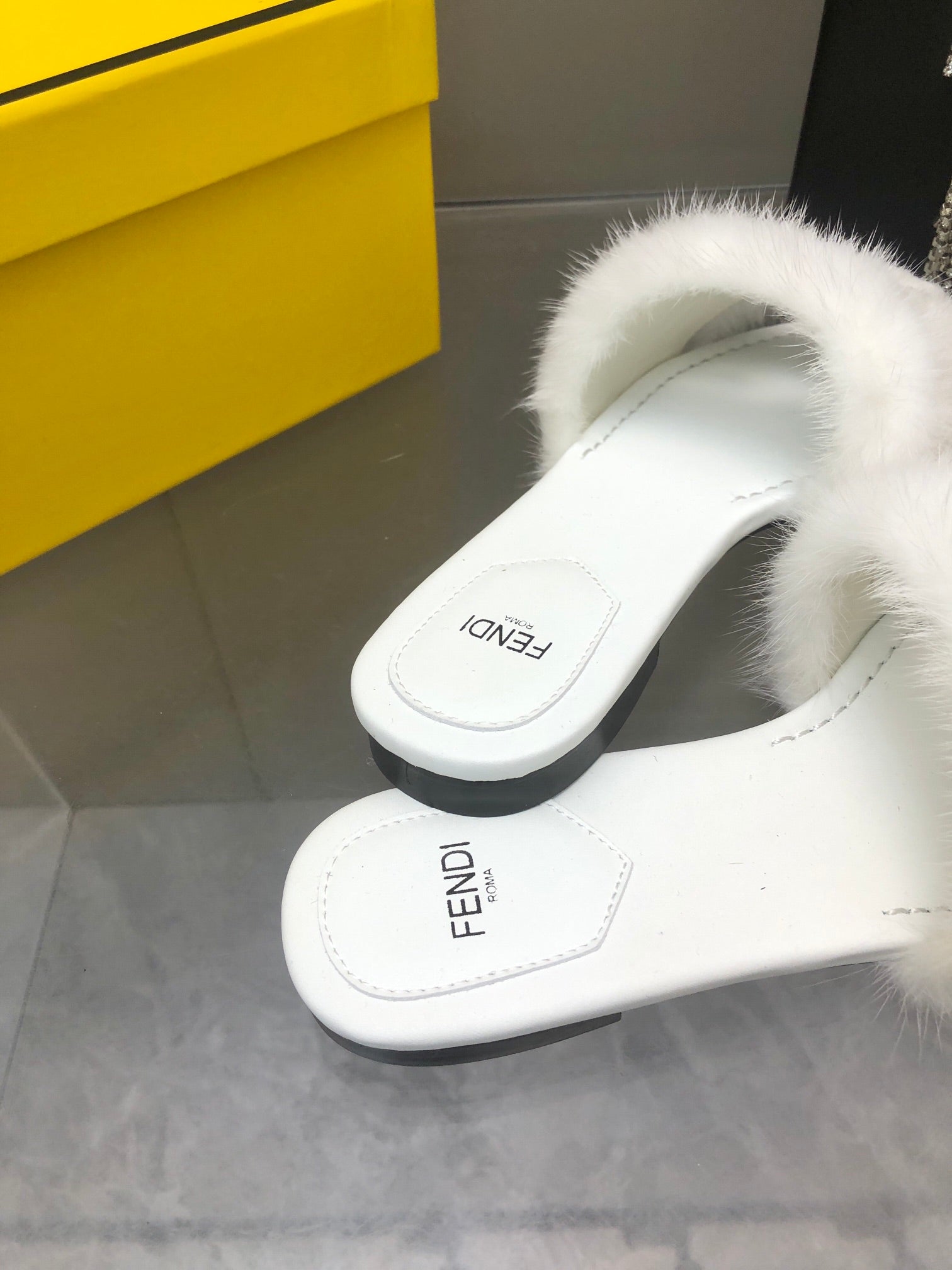 FENDI BAGUETTE MINK SLIDE SLIPPER IN WHITE FUR