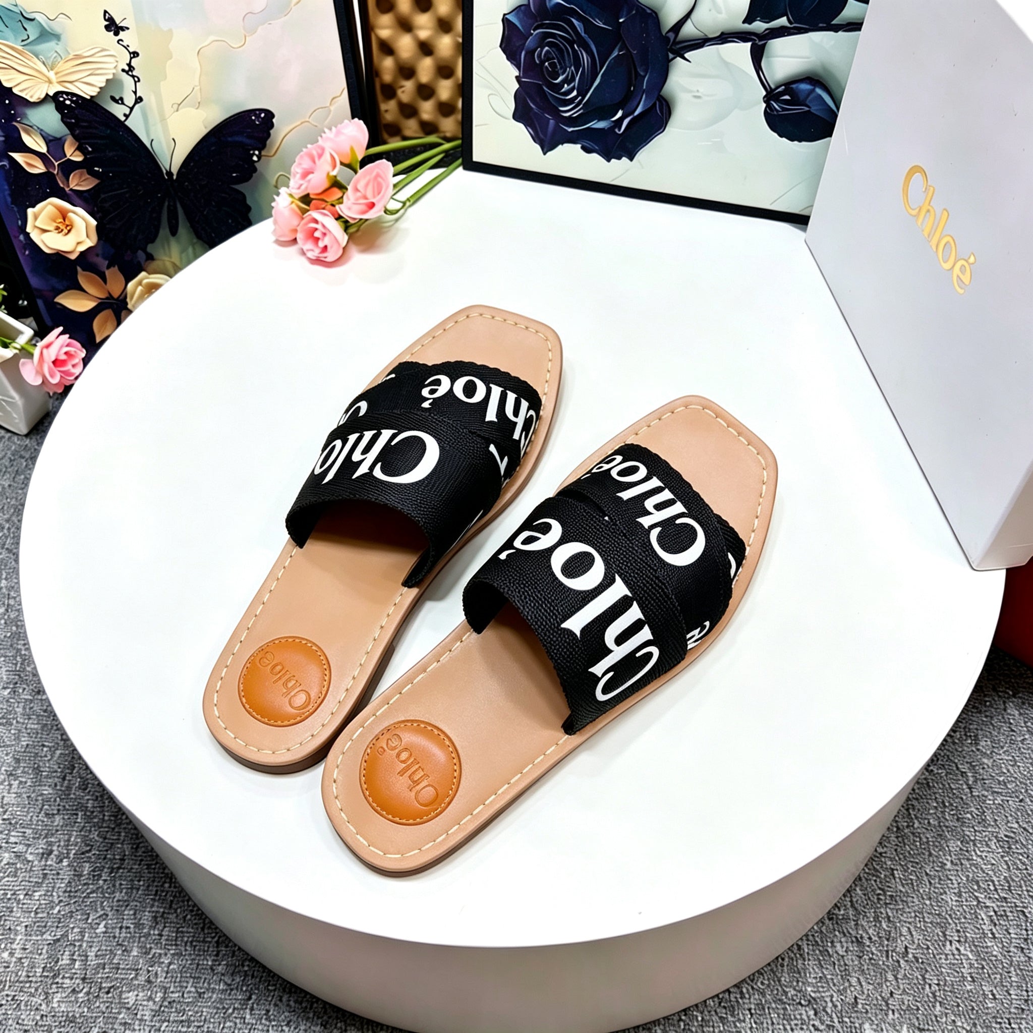 CHLOE 26S CRISSCROSS SLIDES IN BLACK CANVAS