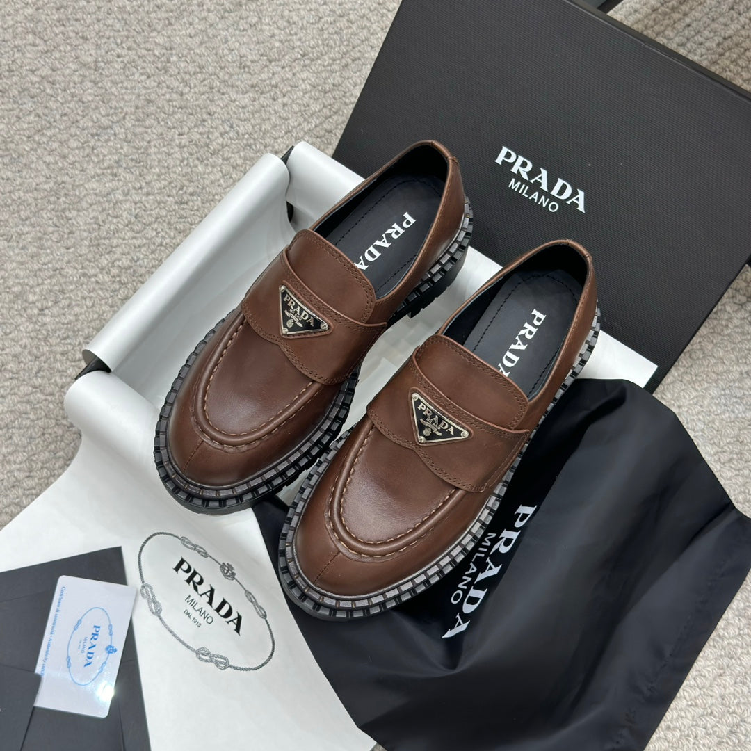 PRADA 25S LOAFER 50MM IN DARK BROWN CALFSKIN LOGO