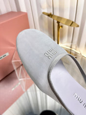 MIUMIU 26S FLAT MULES IN GREY FABRIC AND LEATHER