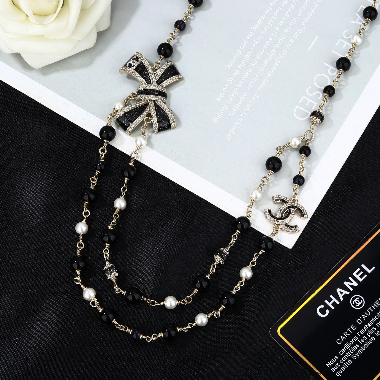 CHANEL 25S CHAIN BELT IN BLACK AND WHITE PEARL 614285