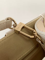 LV 25S ONTHEGO PM BAG 25 IN BEIGE DREAM EMBOSSED TEXTURED CALFSKIN