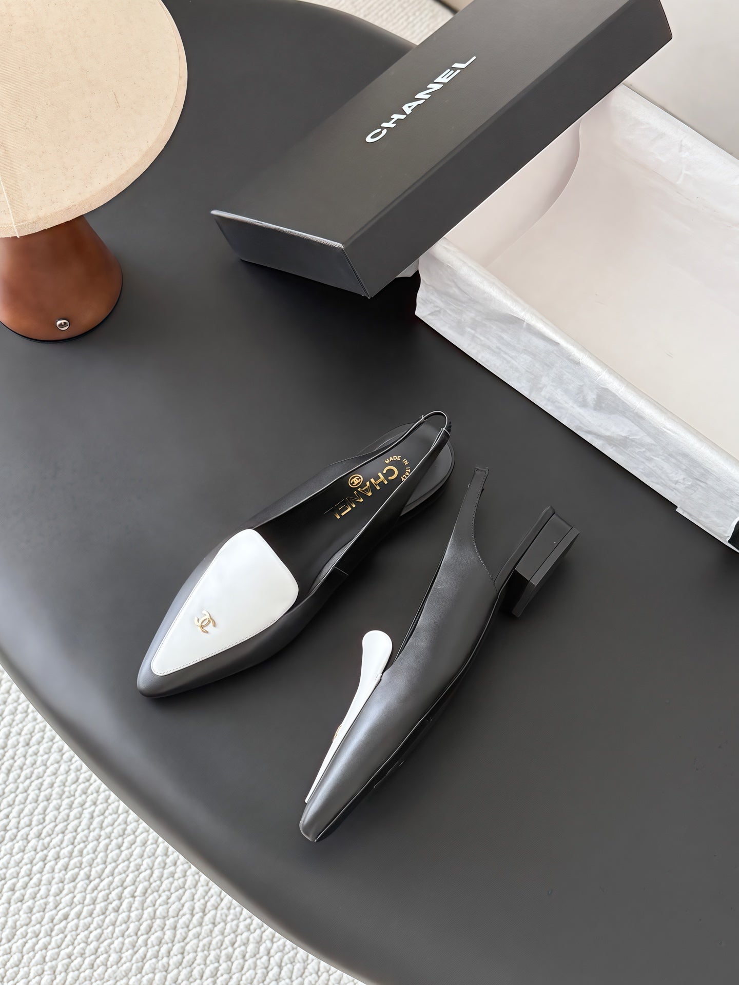 CHANEL 26S SLINGBACK FLAT IN BLACK AND WHITE CALFSKIN WITH CC LOGO