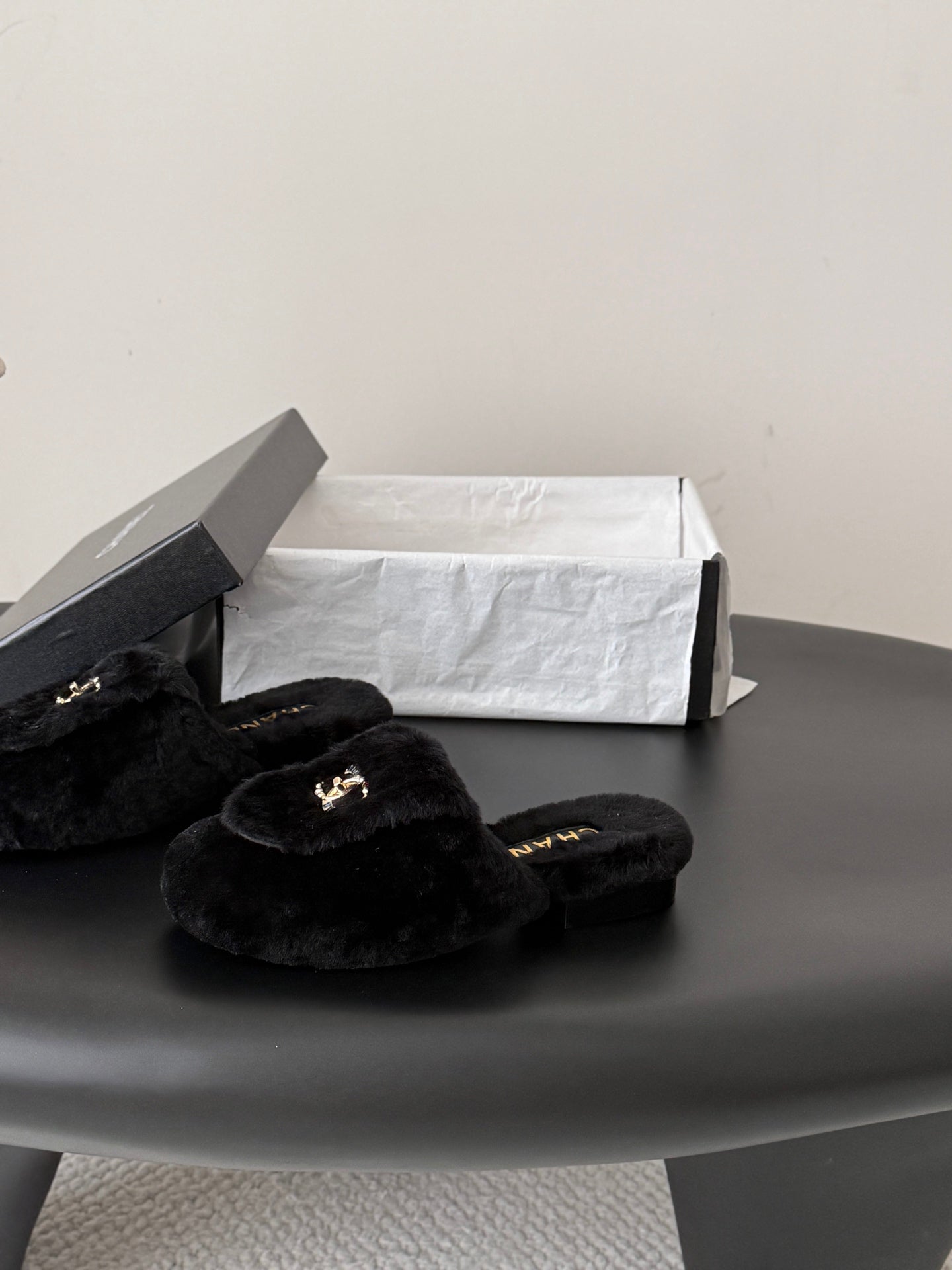 CHANEL 26S MULES IN BLACK SHEARLING LINING