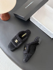 CHANEL 26S MULES IN BLACK SHEARLING AND SUEDE