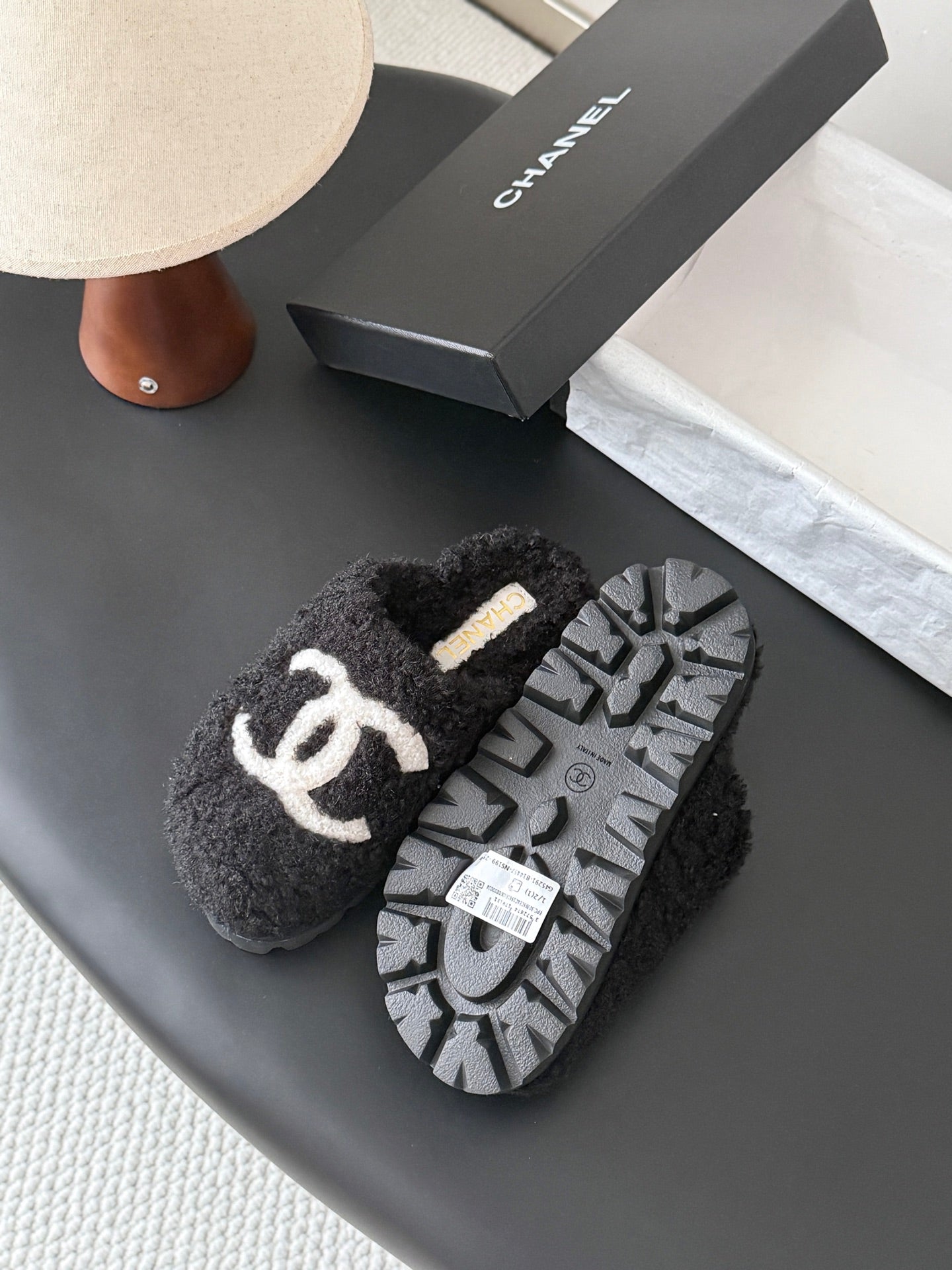 CHANEL 26S SLIDE SANDALS IN BLACK SHEARLING UPPER AND LINING WITH WHITE CC LOGO