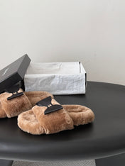 CHANEL 26S SLIDE SANDALS IN BROWN SHEARLING WITH BLACK BOW