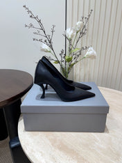 CURVED HEEL SHALLOW MOUTH PUMPS IN BLACK CALFSKIN