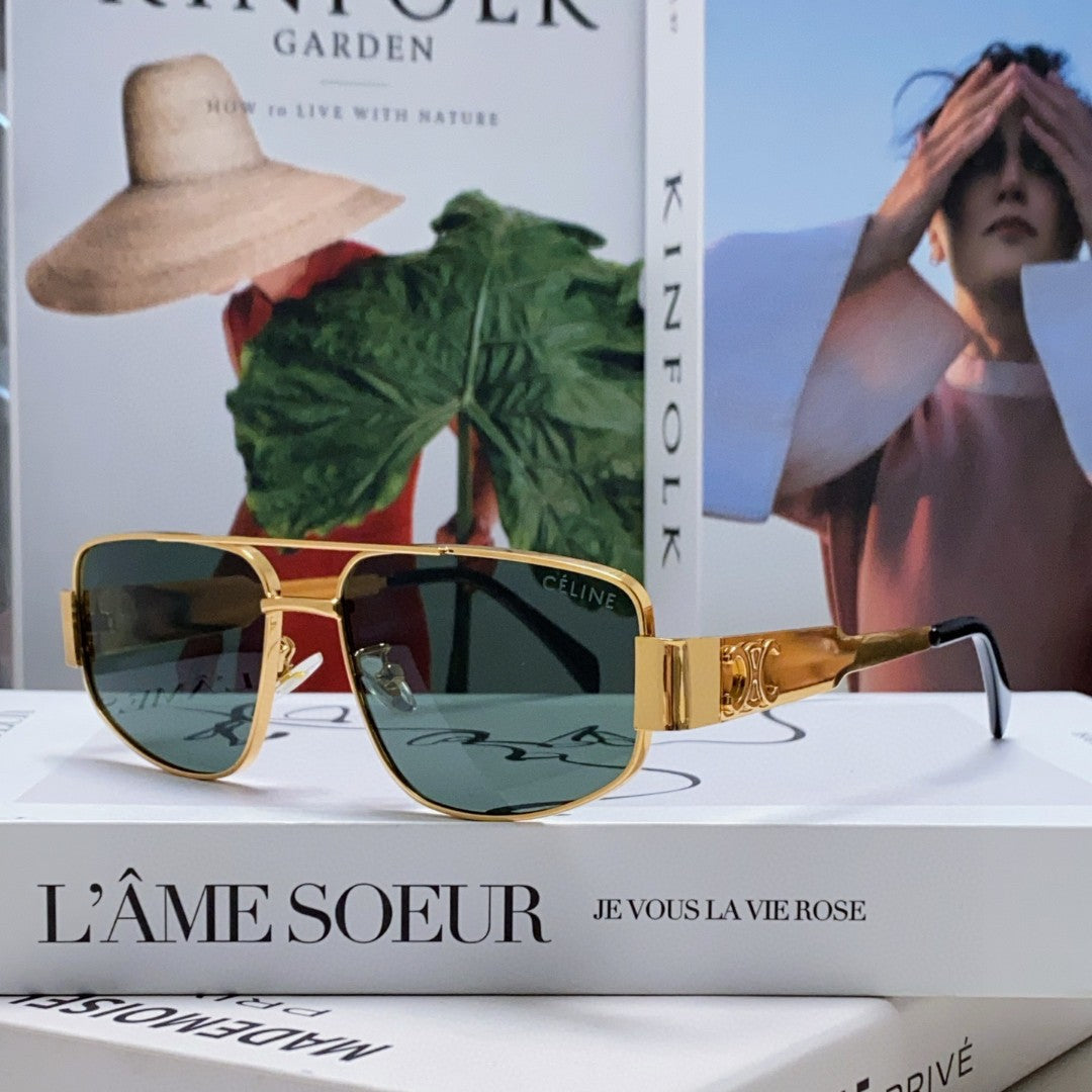 TRIOMPHE SUNGLASS 512997 IN GOLD METAL BLUE LENSES