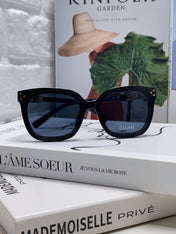 TRIOMPHE SUNGLASSES  573252 IN BLACK ACETATE METAL LOGO
