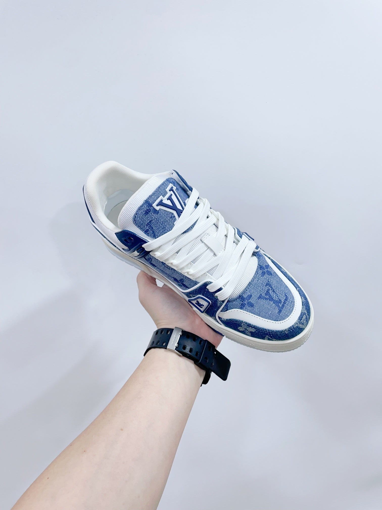 LV TRAINER SNEAKER IN CERULEAN BLUE MONOGRAM DENIM