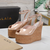 ALAIA WEDGE SANDAL IN BEIGE TAN GLOSSY CALFSKIN AND BEIGE RUBBER