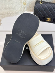 PLATFORM SLIPPERS IN WHITE LAMBSKIN