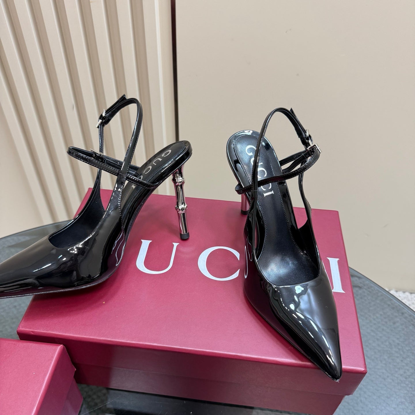 POINTED-TOE HIGH BAMBOO-EFFECT HEEL SLINGBACK IN BLACK PATENT CALFSKIN