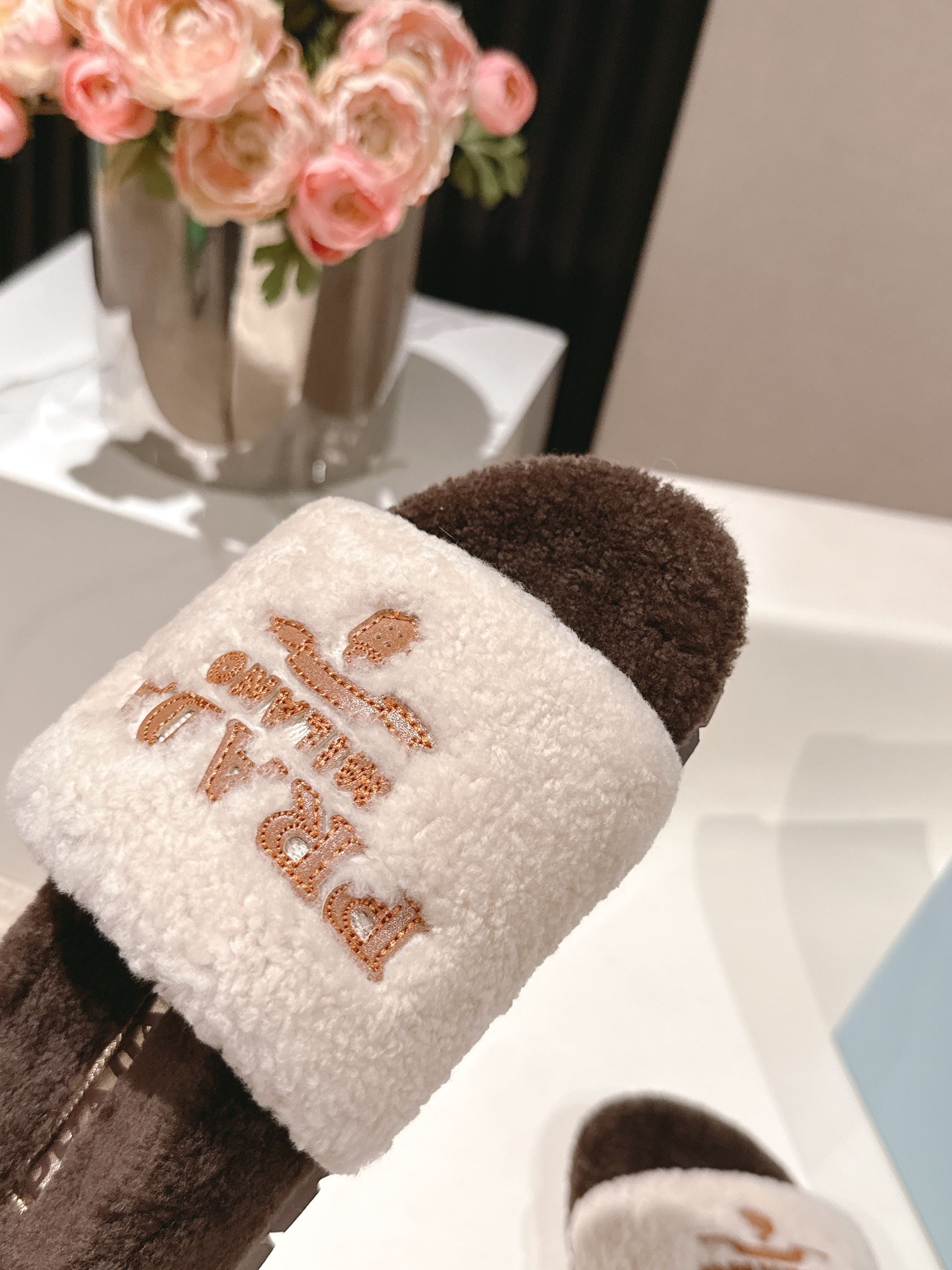 PRADA 25S FLAT MULES IN WHITE AND DARK BROWN RABBIT FUR
