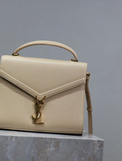 CASSANDRA TOP HANDLE BAG 24 IN BEIGE CALFSKIN GOLD HARDWARE