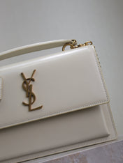 YSL 25S SUNSET MM 25 IN IVORY CALFSKIN GOLD HARDWARE
