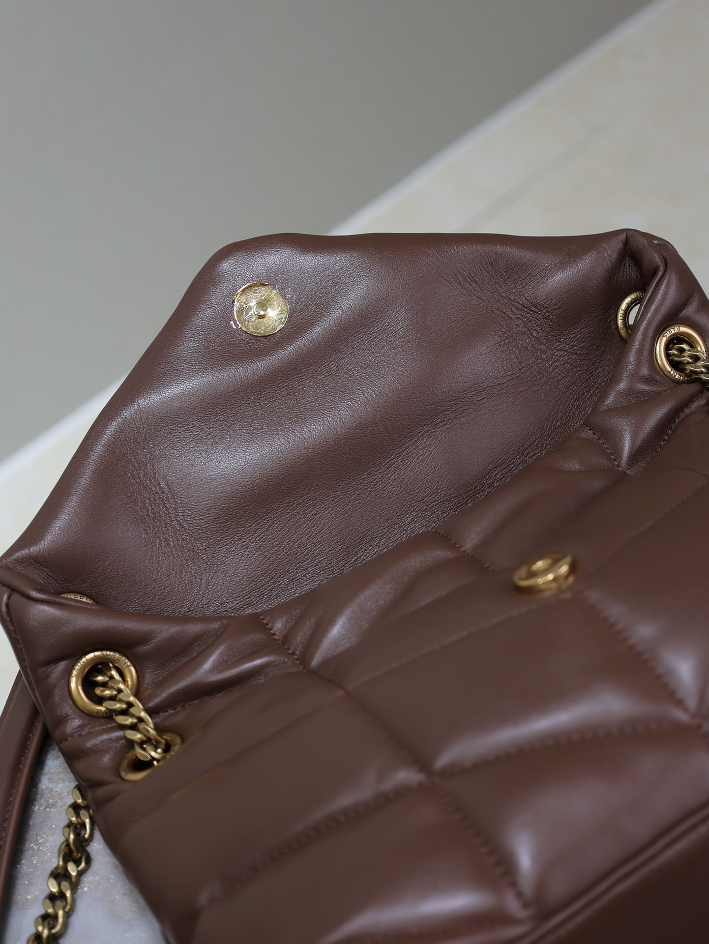 YSL 25S LOULOU PUFFER MM 29 IN DARK BROWN CALFSKIN GOLD HARDWARE