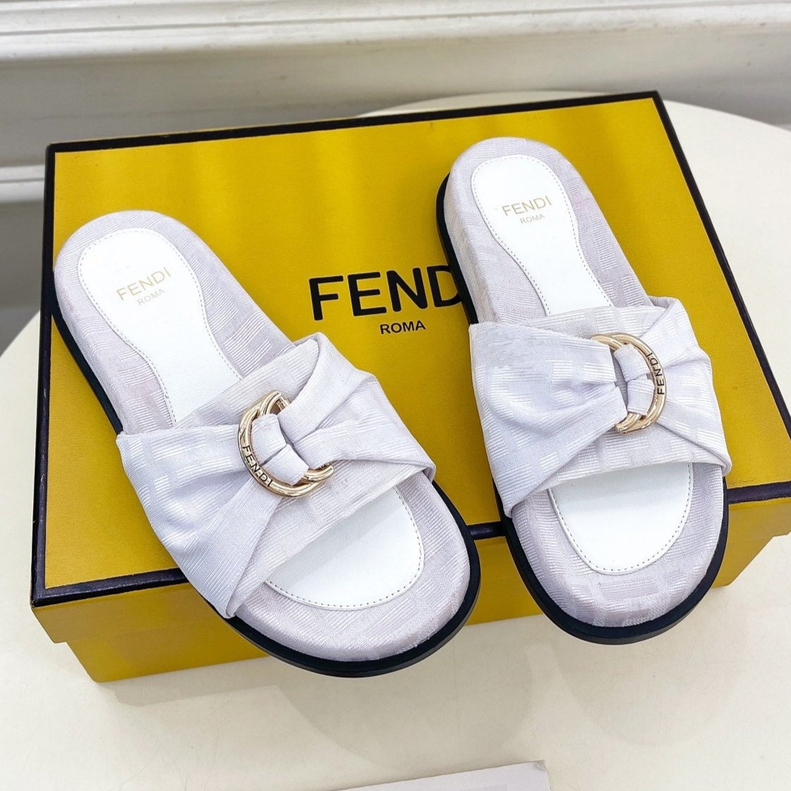FENDI FLAT SLIPPER IN WHITE JACQUARD FABRIC WITH GOLD HARDWARE
